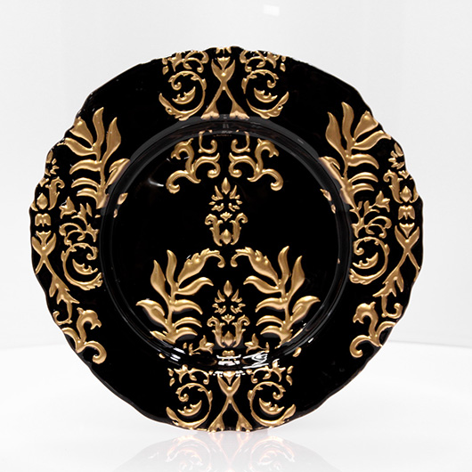 gold and black glass charger plate