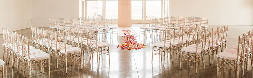 champagne chiavari chairs with ivory cushions